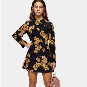 Gold and black floral print long sleeved mini